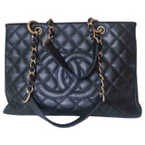 Chanel grand shopping black leather handbag