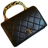 Chanel black leather handbag