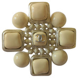 Chanel ecru metal pins & brooches