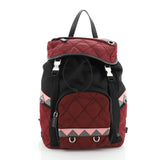 Prada black cloth backpacks