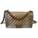 Chanel boy gold leather handbag