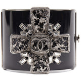 Chanel black plastic bracelets