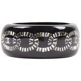 Chanel black plastic bracelets