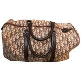 Dior burgundy cloth travel bag