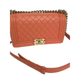 Chanel boy orange leather handbag