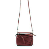 Loewe puzzle  burgundy leather handbag