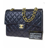 Chanel timeless/classique navy leather handbag