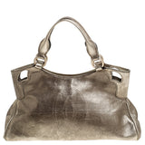 Cartier marcello gold leather handbag