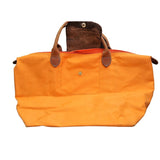 Longchamp pliage  orange synthetic handbag