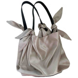 Nanushka beige silk handbag