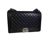Chanel boy black leather handbag