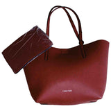 Calvin Klein burgundy leather handbag