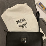 Mcm black leather clutch bag