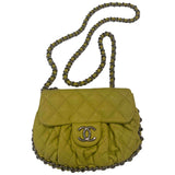 Chanel chain around yellow leather handbag
