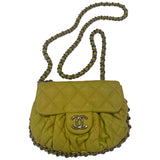 Chanel chain around yellow leather handbag