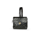 Chanel timeless/classique black leather backpacks