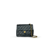 Chanel timeless/classique black leather handbag