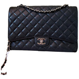Chanel timeless/classique black leather handbag