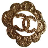 Chanel cc gold metal pins & brooches
