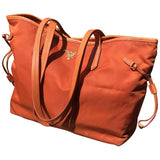Prada orange cloth handbag