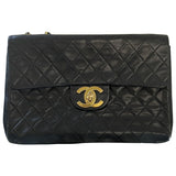 Chanel timeless/classique black leather handbag