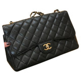 Chanel timeless/classique black leather handbag