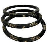 Chanel black plastic bracelets
