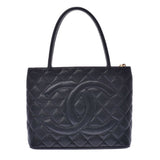 Chanel médaillon black leather handbag