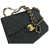 Chanel timeless/classique black leather handbag