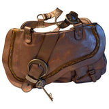 Dior gaucho gold leather handbag