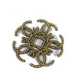 Chanel cc yellow metal pins & brooches