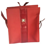 Courrèges red plastic backpacks