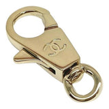 Chanel gold metal bag charms