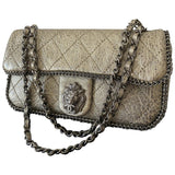Chanel gold leather handbag