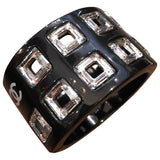 Chanel black metal bracelets