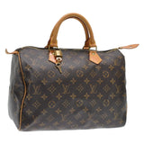 Louis Vuitton speedy brown cloth handbag