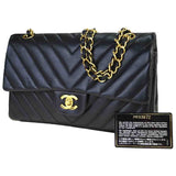 Chanel timeless/classique black leather handbag