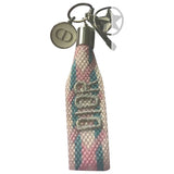 Dior pink cloth bag charms