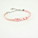 Dior pink plastic bracelets