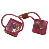 Louis Vuitton inclusion  plastic hair accessories