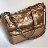 Chanel gabrielle gold leather handbag