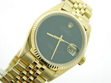 Pre Owned Mens Rolex Yellow Gold Datejust with a Black Onyx Dial 16018