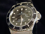 PRE OWNED MENS ROLEX STAINLESS STEEL SUBMARINER DATE WITH A BLACK DIAL 16610