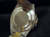 PRE OWNED MENS ROLEX TWO-TONE GMT-MASTER II WITH A BLACK DIAL 16713