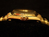 PRE OWNED MENS ROLEX YELLOW GOLD OYSTER PERPETUAL WITH A CHAMPAGNE DIAL 1003