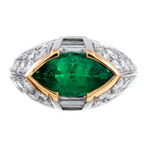 CONTEMPORARY HAND MADE MARQUISE EMERALD AND DIAMOND RING