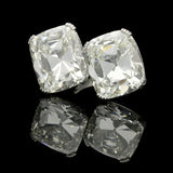 AN EXTRAORDINARY 41.78ct CUSHION CUT DIAMOND CROSSOVER \'UNUM\' RING BY AMY BURTON
