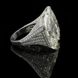 AN EXTRAORDINARY 41.78ct CUSHION CUT DIAMOND CROSSOVER \'UNUM\' RING BY AMY BURTON