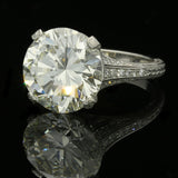A STUNNING ROUND BRILLIANT DIAMOND SOLITAIRE RING BY HANCOCKS