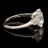 A BEAUTIFUL OLD MINE CUT DIAMOND RING WITH DIAMOND BULLET SHOULDERS BY HANCOCKS
